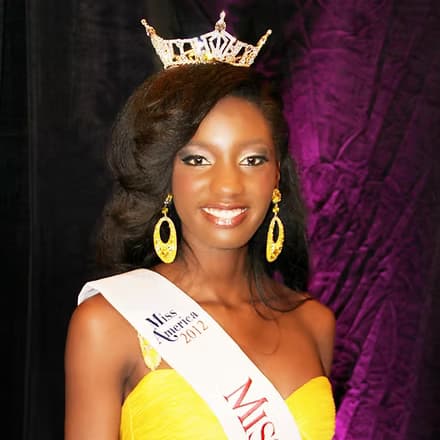 Azah Awasum, Miss Miami 2012, smiling in crown and sash.